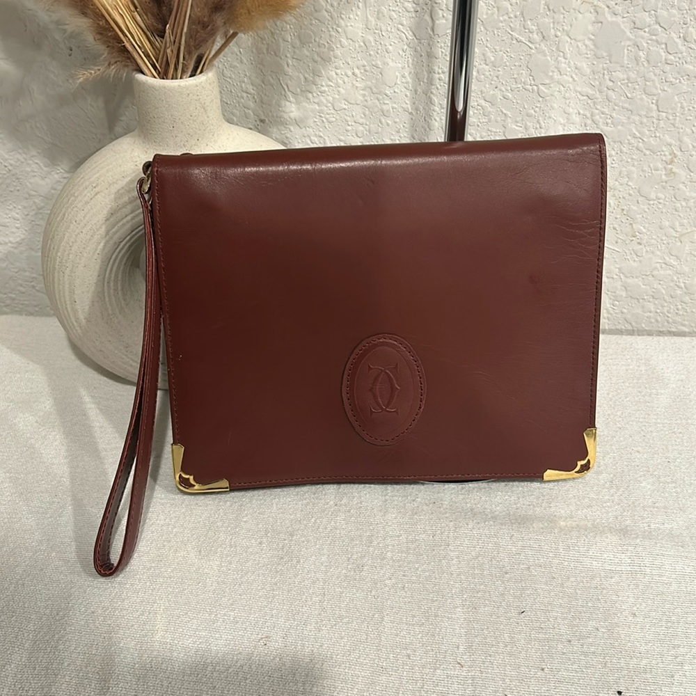 Authentic Cartier Must De Cartier Leather Bordeaux wristlet